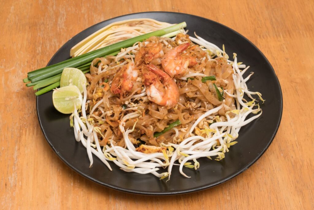 Close Up Plate Of Padthai, Thai Noodle With Fried Shrimp And Veg